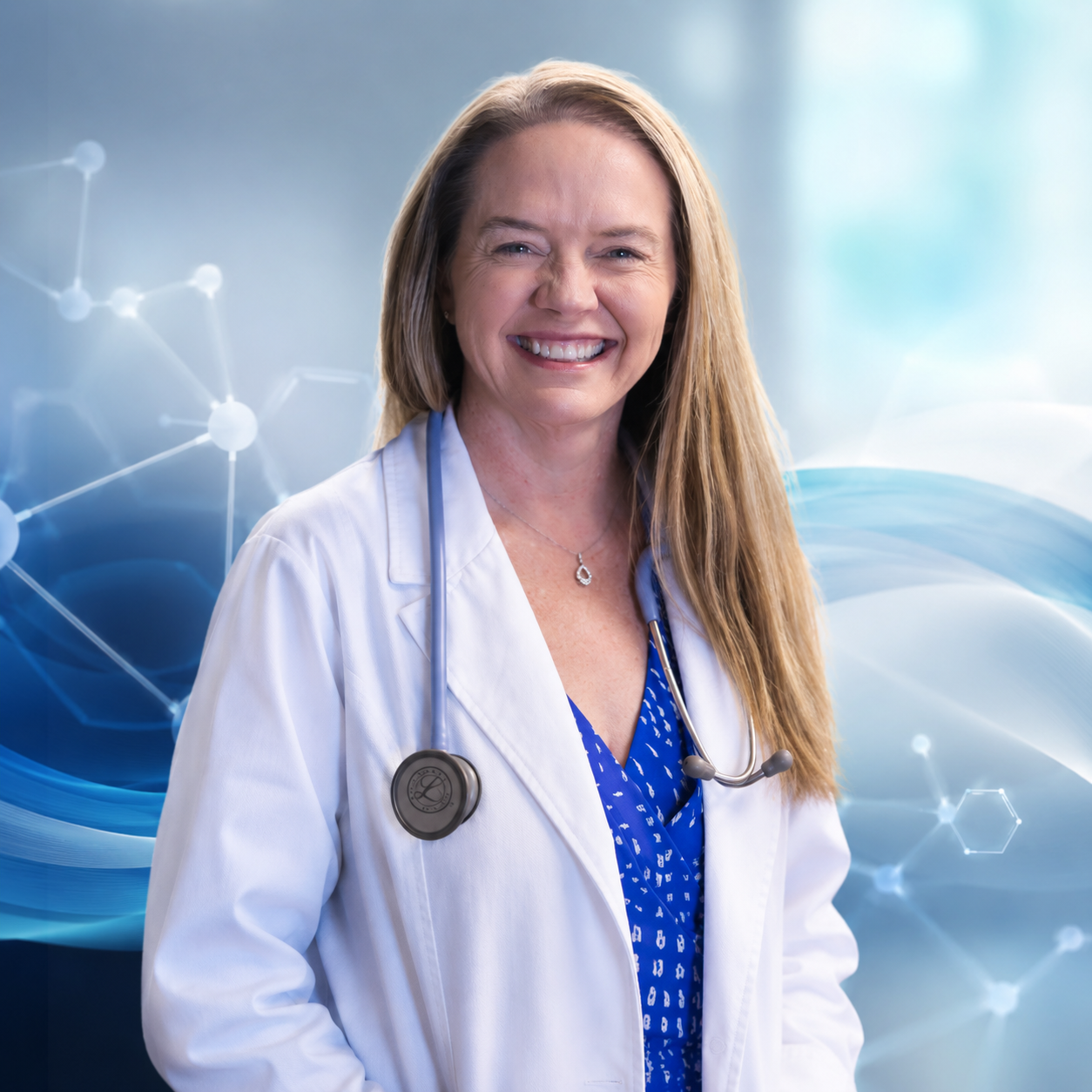 Angela Jayes, NP smiling in a professional medical setting for RealGLP.Life